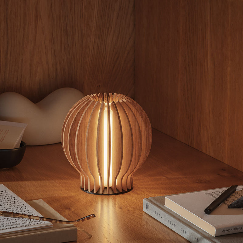 eva solo | radiant round portable table lamp | oak