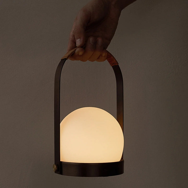 audo copenhagen (menu) | carrie portable table lamp | bronzed brass + leather strap
