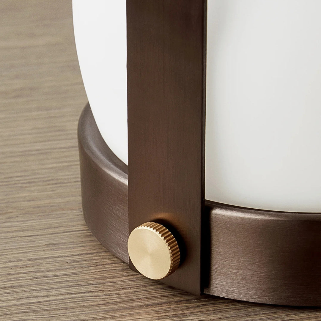 audo copenhagen (menu) | carrie portable table lamp | bronzed brass + leather strap