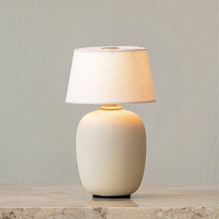 audo copenhagen | torso table lamp | portable - sand