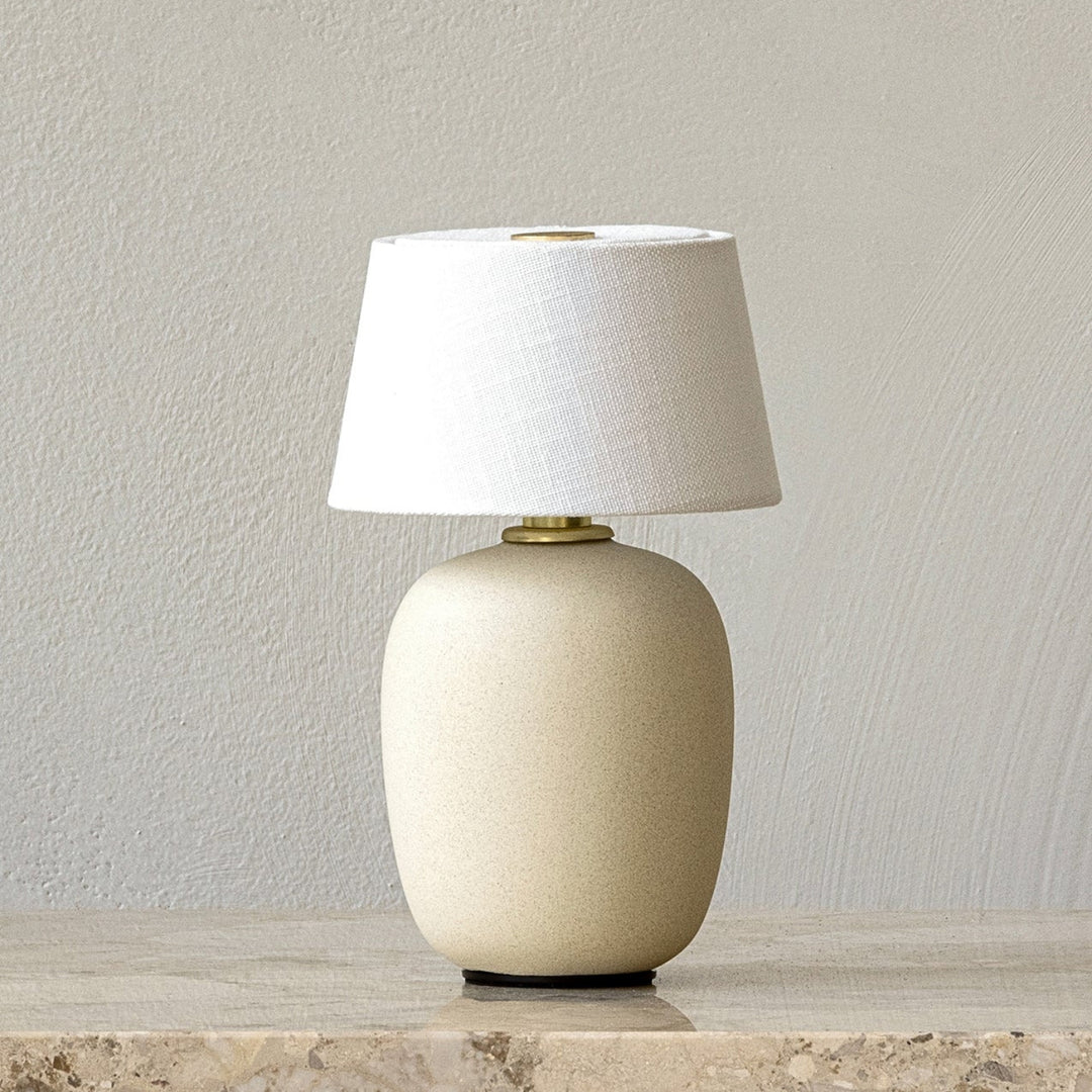 audo copenhagen | torso table lamp | portable - sand