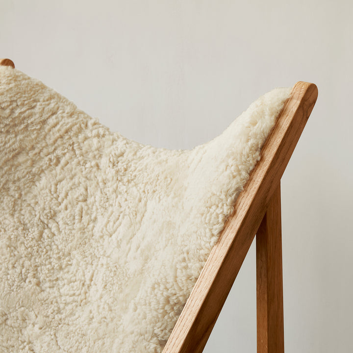 audo copenhagen (menu) | knitting lounge chair | sheepskin nature + natural oak base
