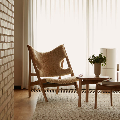 audo copenhagen (menu) | knitting lounge chair | sheepskin nature + natural oak base