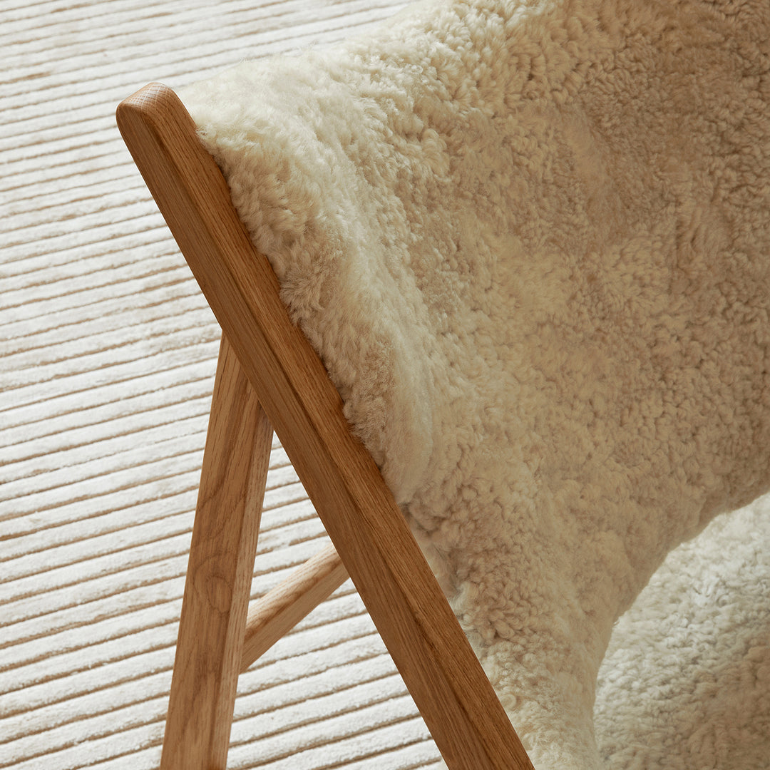 audo copenhagen (menu) | knitting lounge chair | sheepskin nature + natural oak base