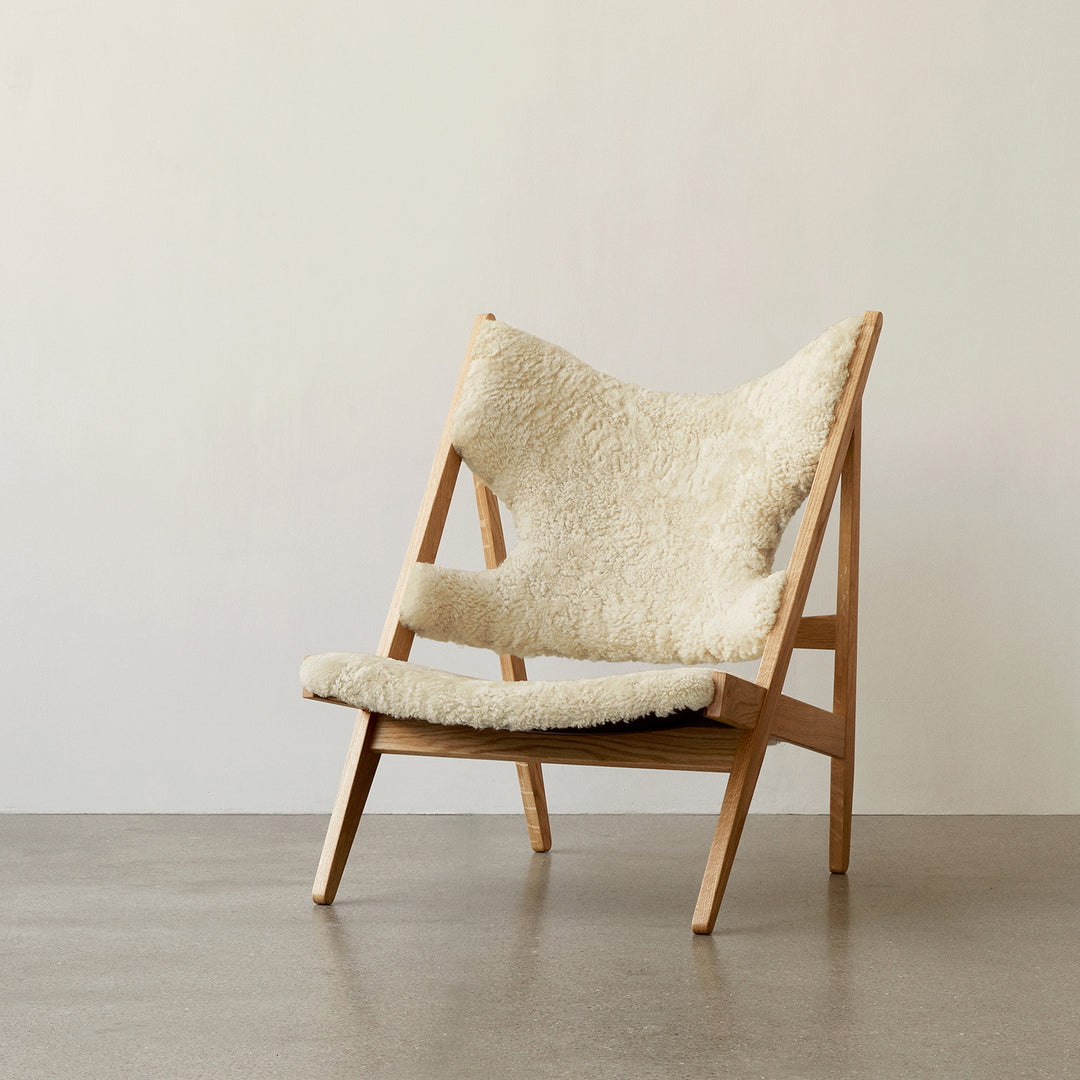 audo copenhagen (menu) | knitting lounge chair | sheepskin nature + natural oak base