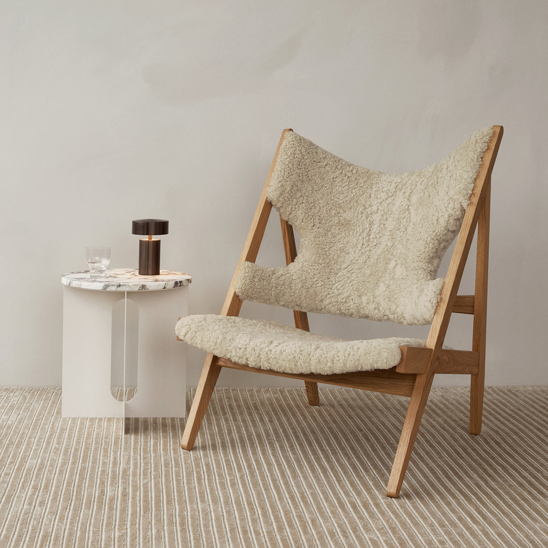 audo copenhagen (menu) | knitting lounge chair | sheepskin nature + natural oak base