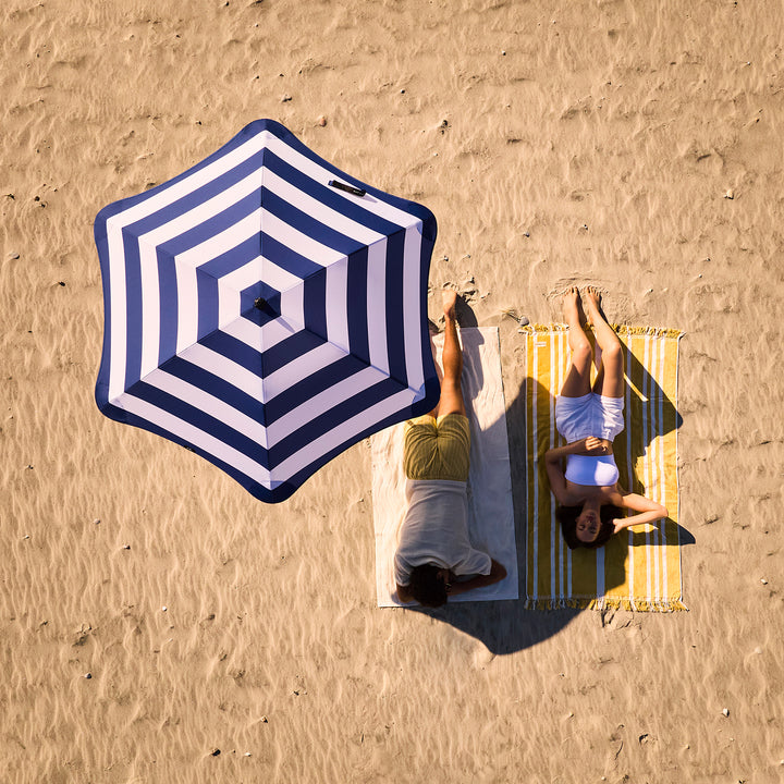 blunt | beach umbrella | sea