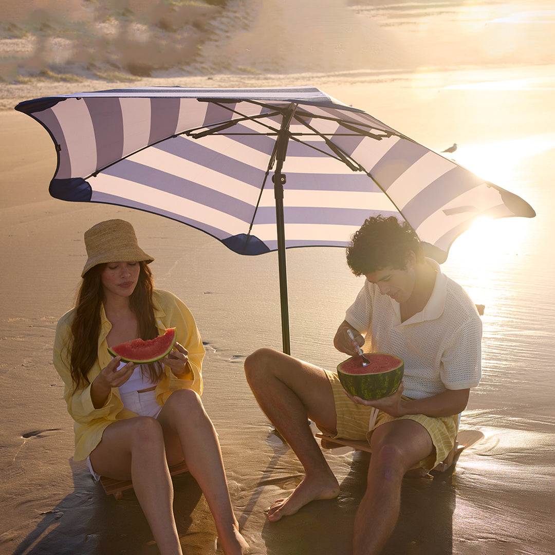 blunt | beach umbrella | sea