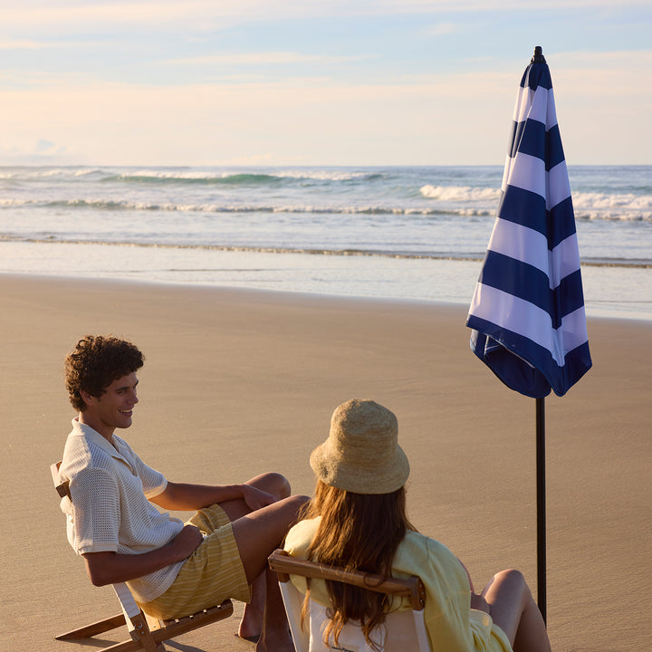 blunt | beach umbrella | sea