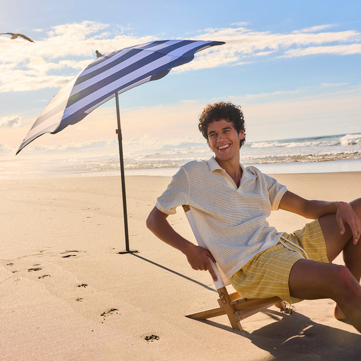 blunt | beach umbrella | sea