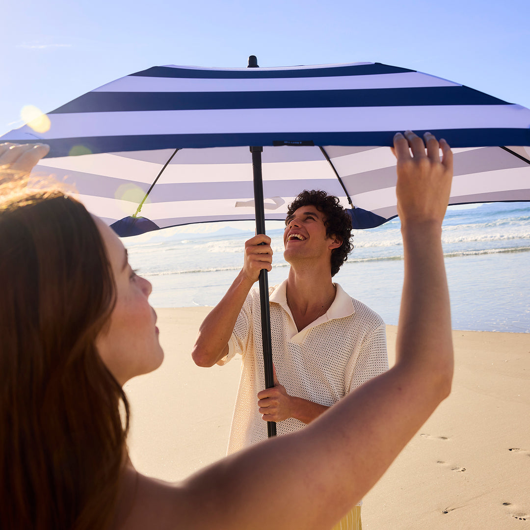 blunt | beach umbrella | sea