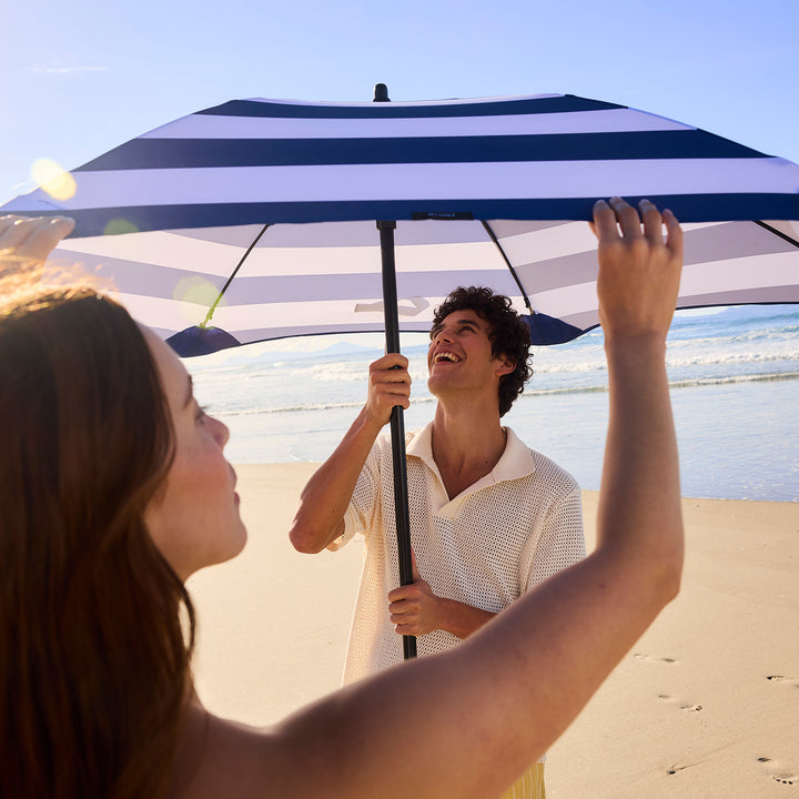blunt | beach umbrella | sea