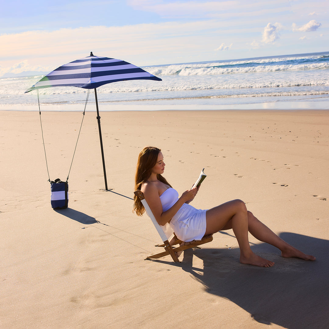 blunt | beach umbrella | sea