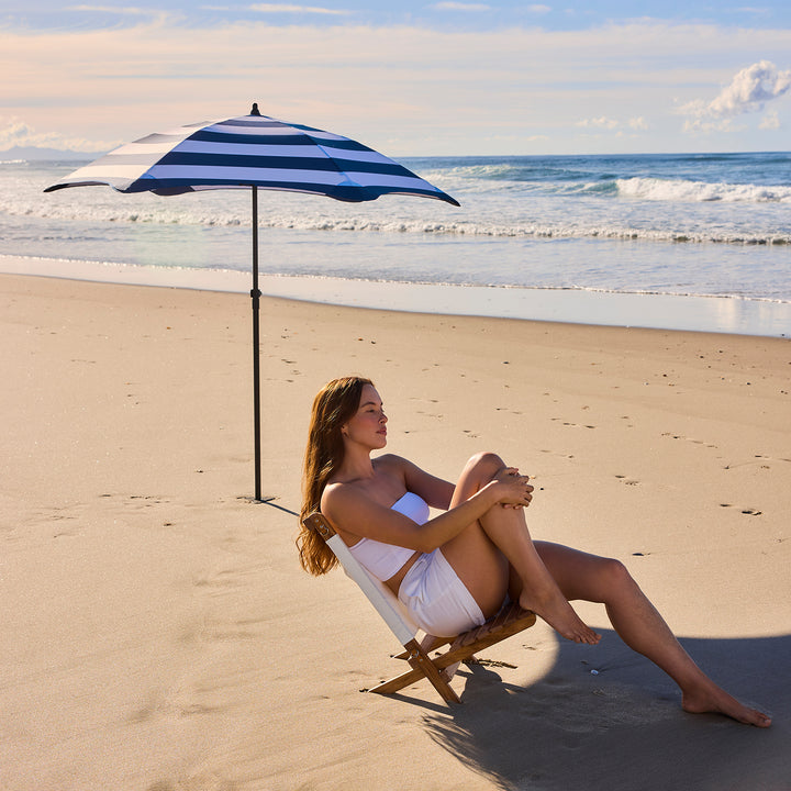 blunt | beach umbrella | sea