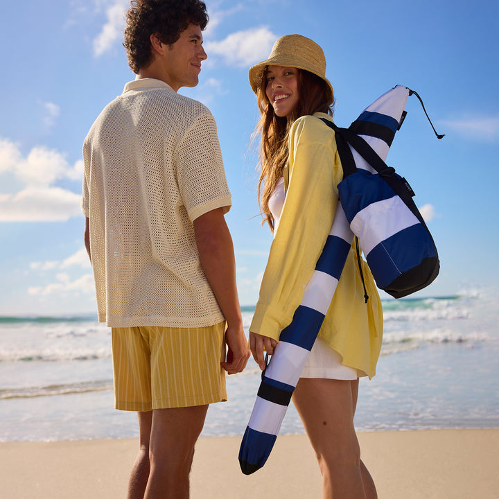 blunt | beach umbrella | sea