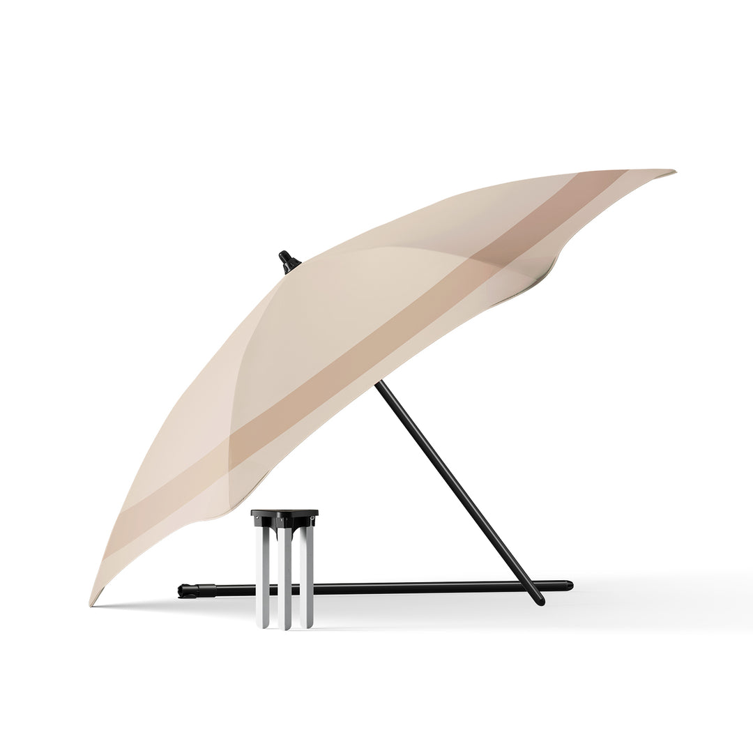 blunt | beach umbrella | sand