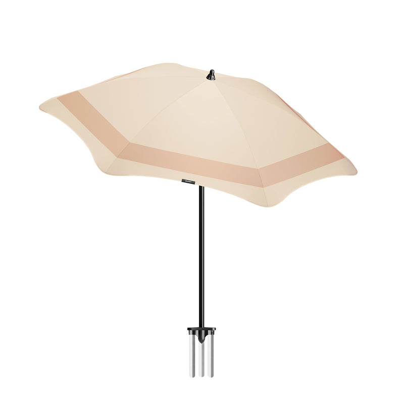 blunt | beach umbrella | sand