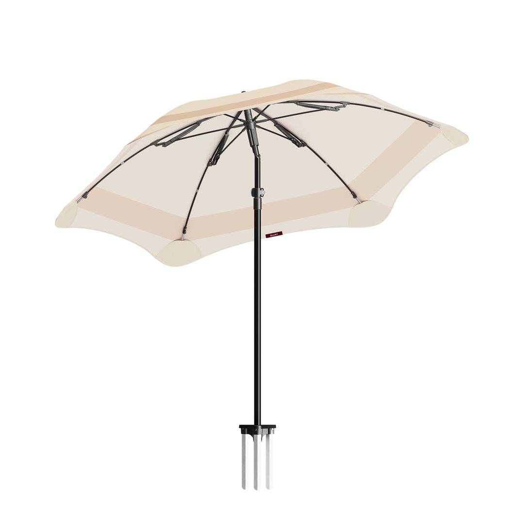 blunt | beach umbrella | sand