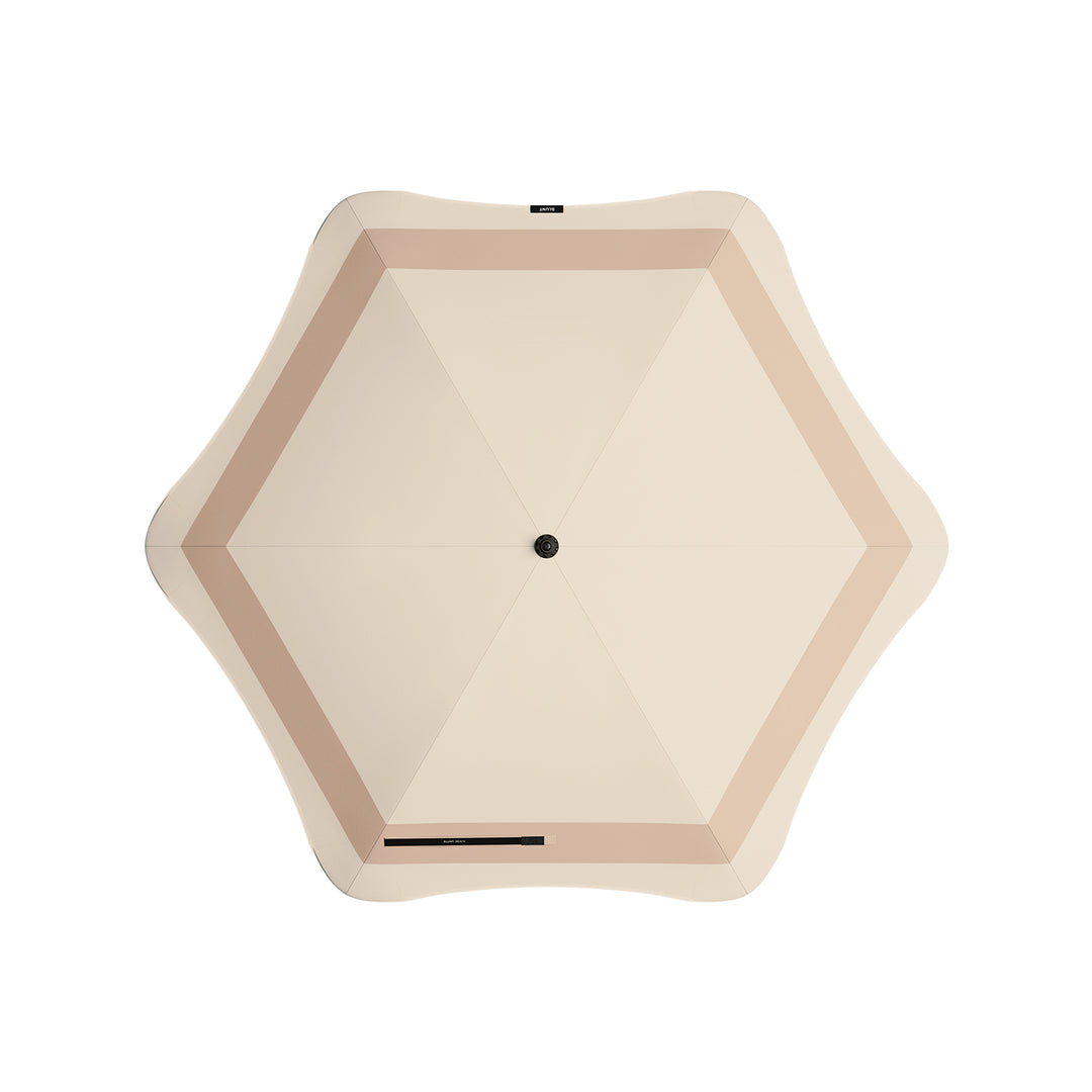 blunt | beach umbrella | sand