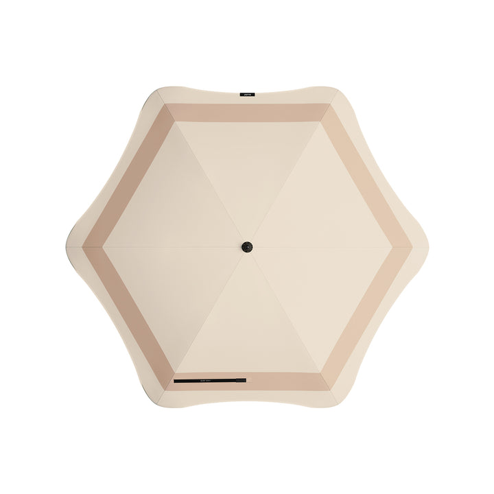 blunt | beach umbrella | sand