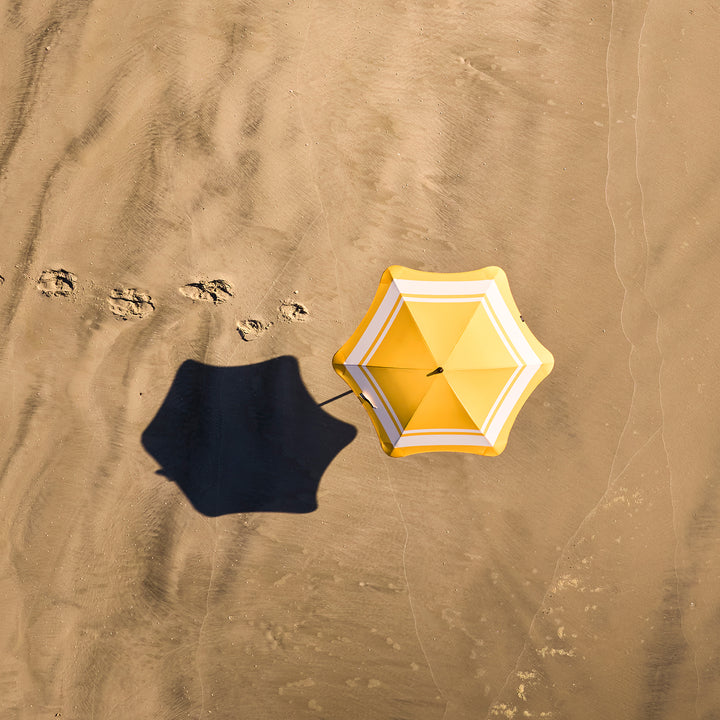 blunt | beach umbrella | sun