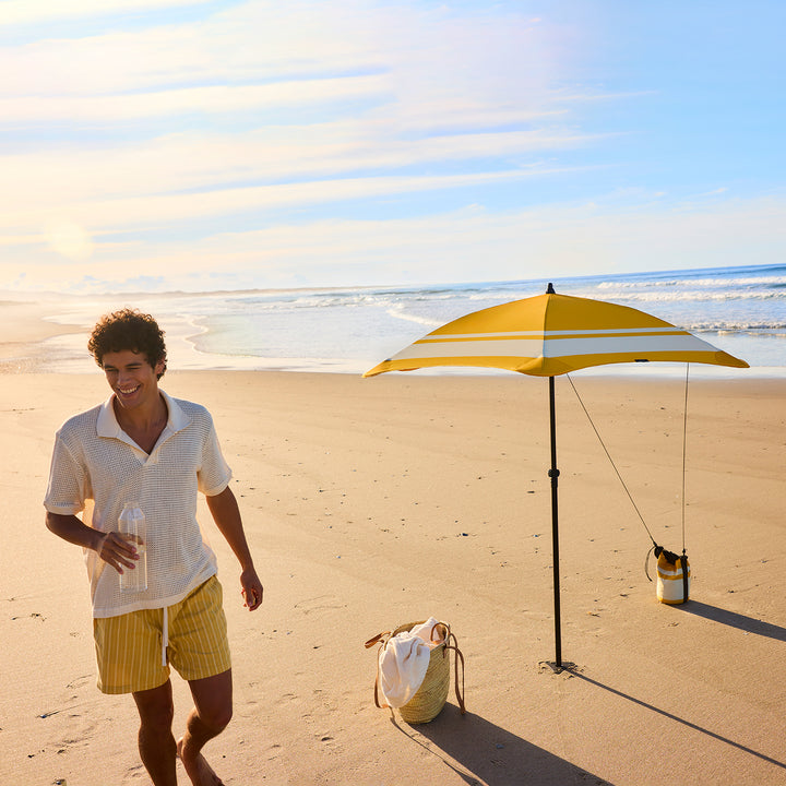 blunt | beach umbrella | sun