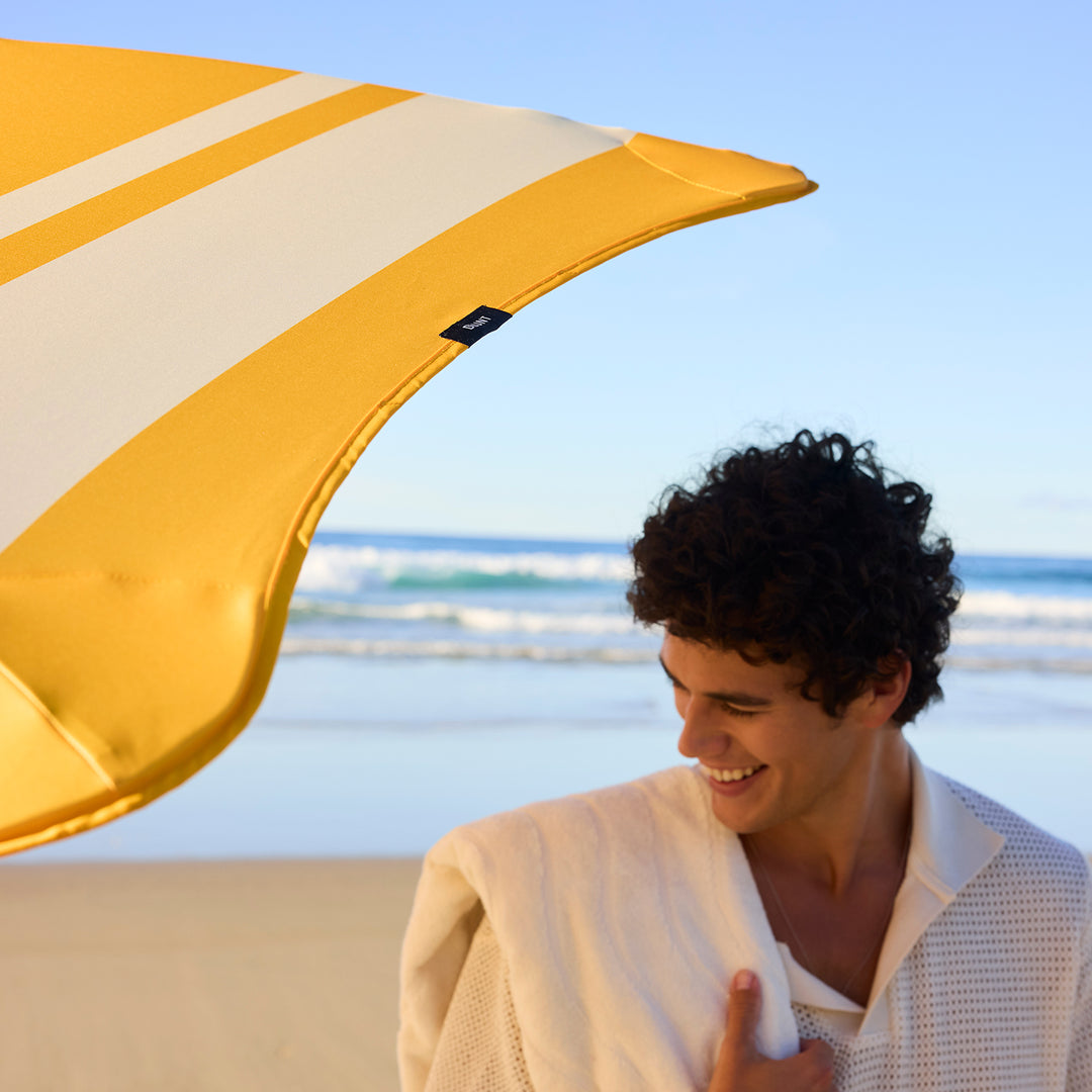 blunt | beach umbrella | sun