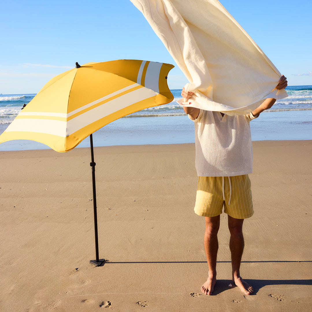 blunt | beach umbrella | sun