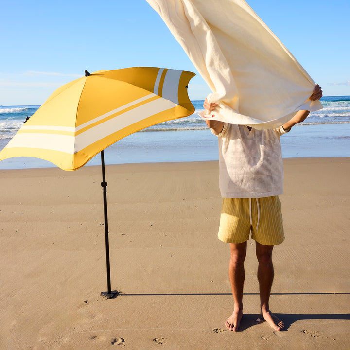 blunt | beach umbrella | sun