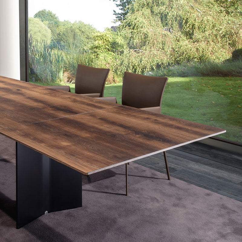 draenert | atlas dining table with swivel extension | belvedere stone + black legs