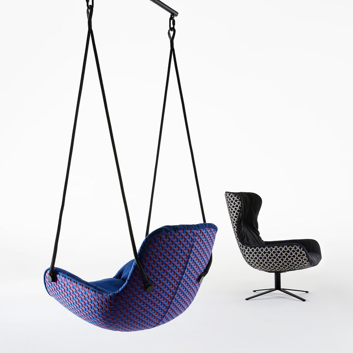 freifrau | leya wingback chair | x-base frame with tilt | cayenne ebony (black) leather + dedar scarabeo