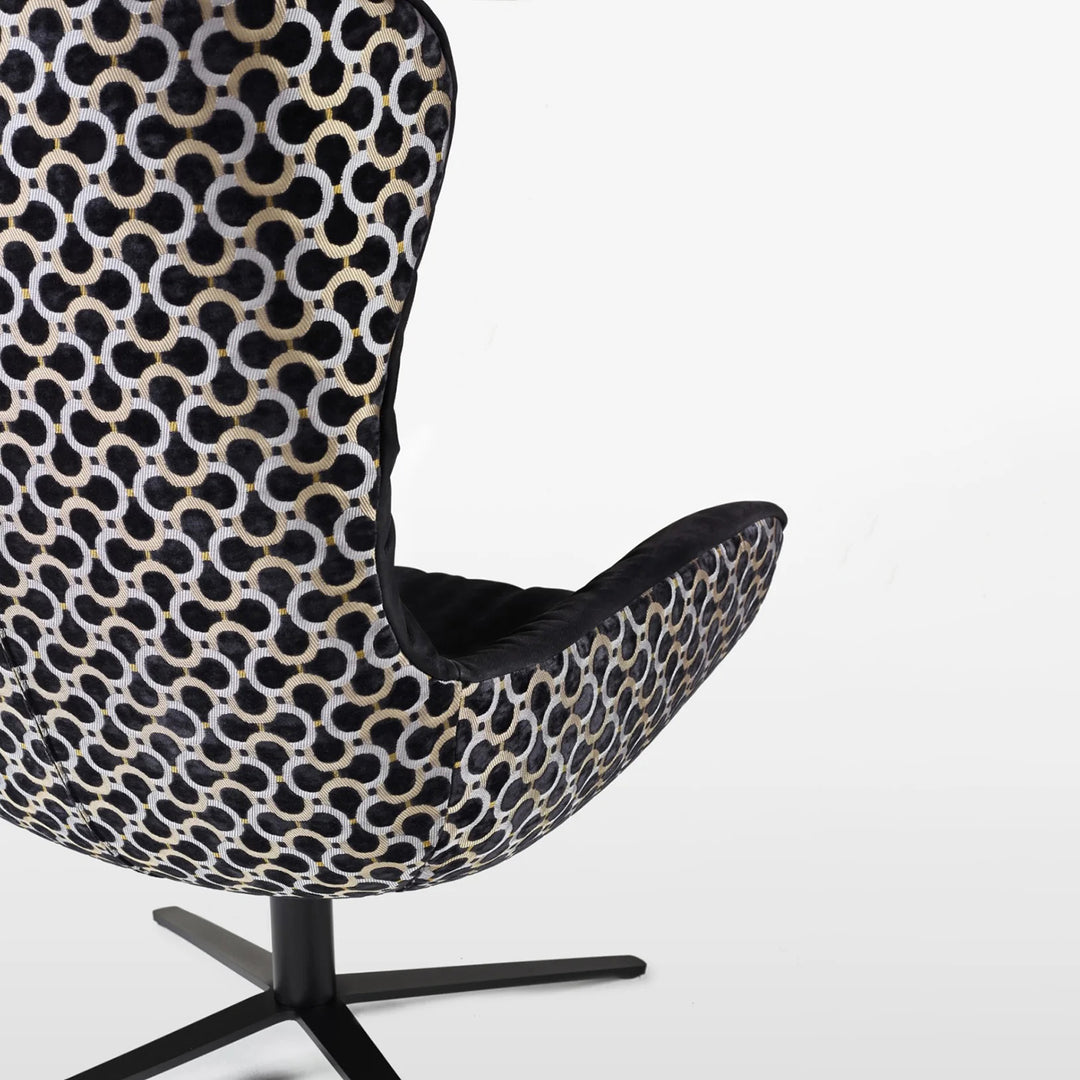 freifrau | leya wingback chair | x-base frame with tilt | cayenne ebony (black) leather + dedar scarabeo