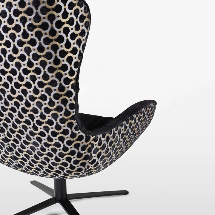 freifrau | leya wingback chair | x-base frame with tilt | cayenne ebony (black) leather + dedar scarabeo