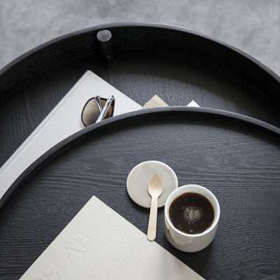 audo copenhagen (menu) | turning coffee table | black ash + brass