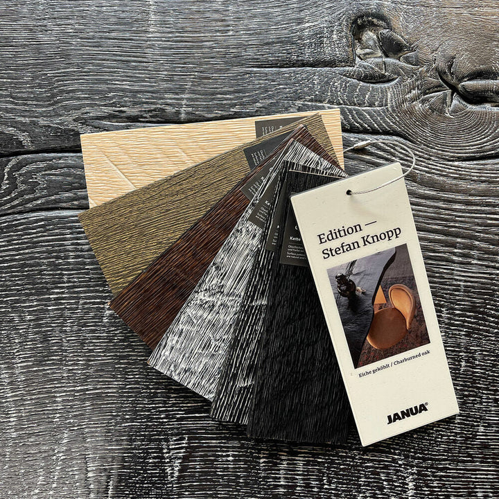 janua | sk 08 butterfly table | charburned oak silver shade + black base 260x100cm