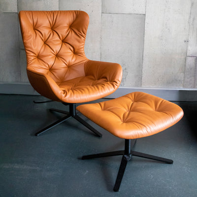 freifrau | leya wingback chair | x-base frame with tilt | cairo cognac leather + chesterfield stitch