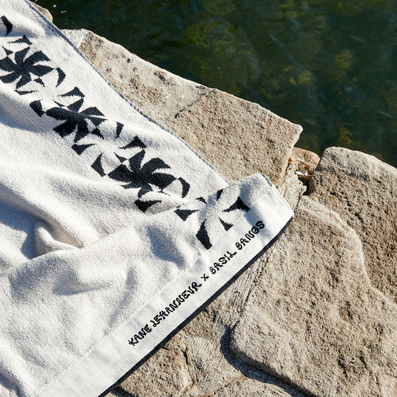 basil bangs | beach towel | flowers